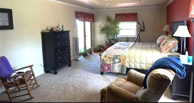 a kitchen with granite countertop a sink and stainless steel appliances