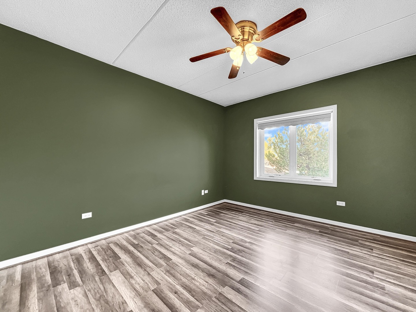 500 East St Charles Road, Unit 201 Lombard, IL 60148 - Photo 18 of 41 a view of room with window and ceiling fan