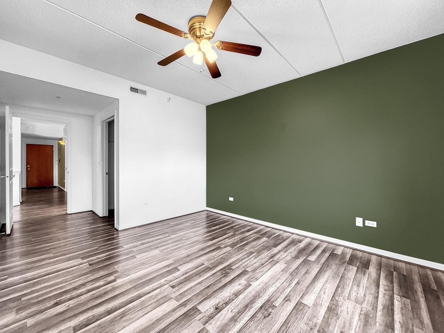 500 East St Charles Road, Unit 201 Lombard, IL 60148 - Photo 19 of 41 wooden floor in an empty room with a window