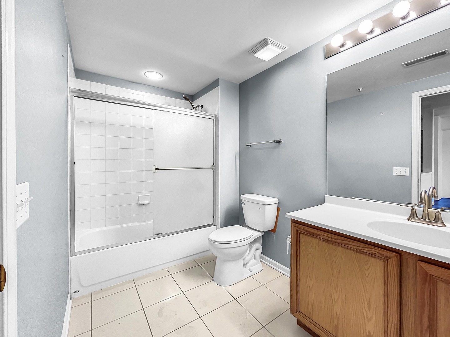 500 East St Charles Road, Unit 201 Lombard, IL 60148 - Photo 27 of 41 a bathroom with a sink toilet and shower