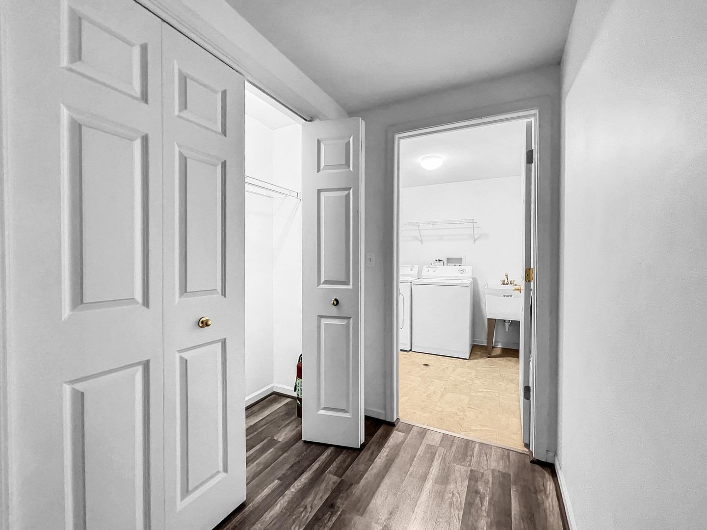 500 East St Charles Road, Unit 201 Lombard, IL 60148 - Photo 29 of 41 a view of a hallway with wooden floor and staircase