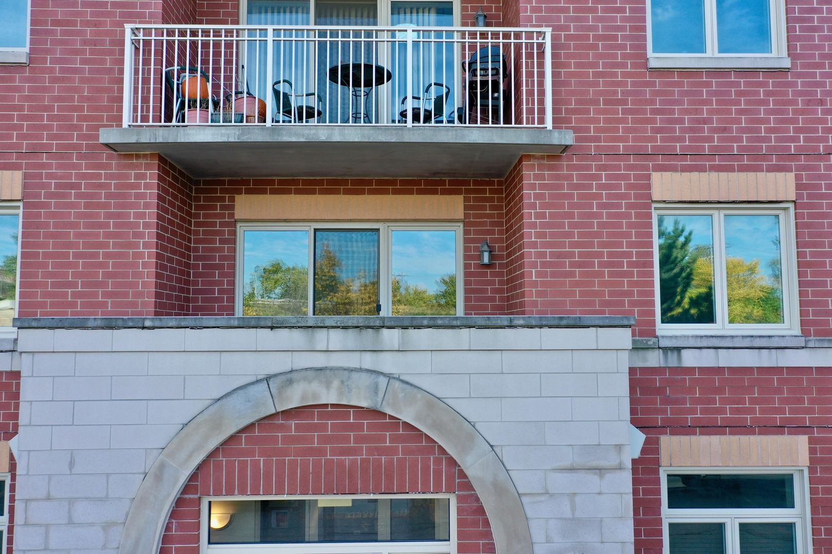 500 East St Charles Road, Unit 201 Lombard, IL 60148 - Photo 40 of 41 a front view of a house with glass windows
