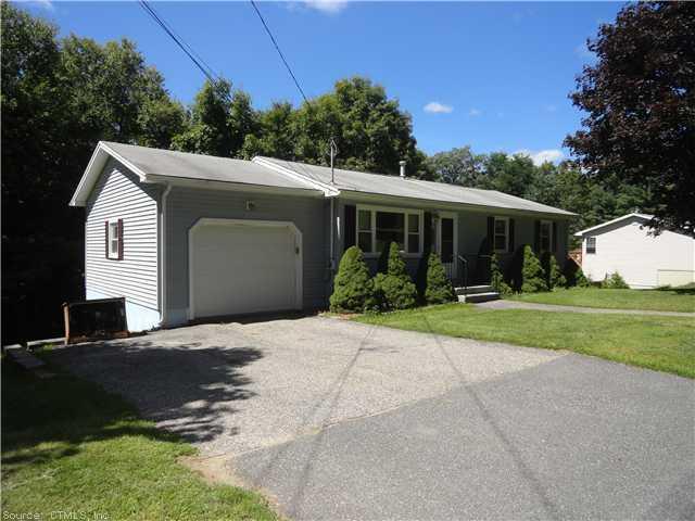 384 County Road Torrington, CT 06790 - Photo 1 of 1 a view of backyard with garden and plants