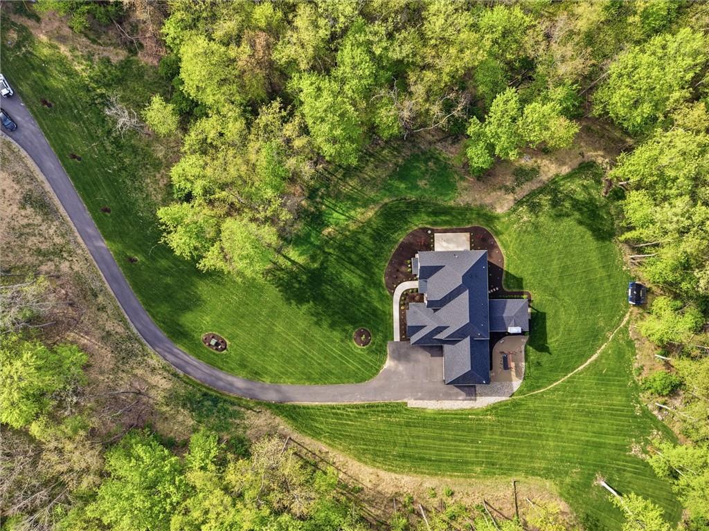 225 Stoup Road Mars, PA 16046 - Photo 50 of 50 A bird's eye view of 225 Stoup Road — the sweeping curved driveway, manicured lawn, and mature tree line tell the full story of what 6.45 private acres looks like. Plenty of open yard space remains for a future pool, already plumbed and ready to go.