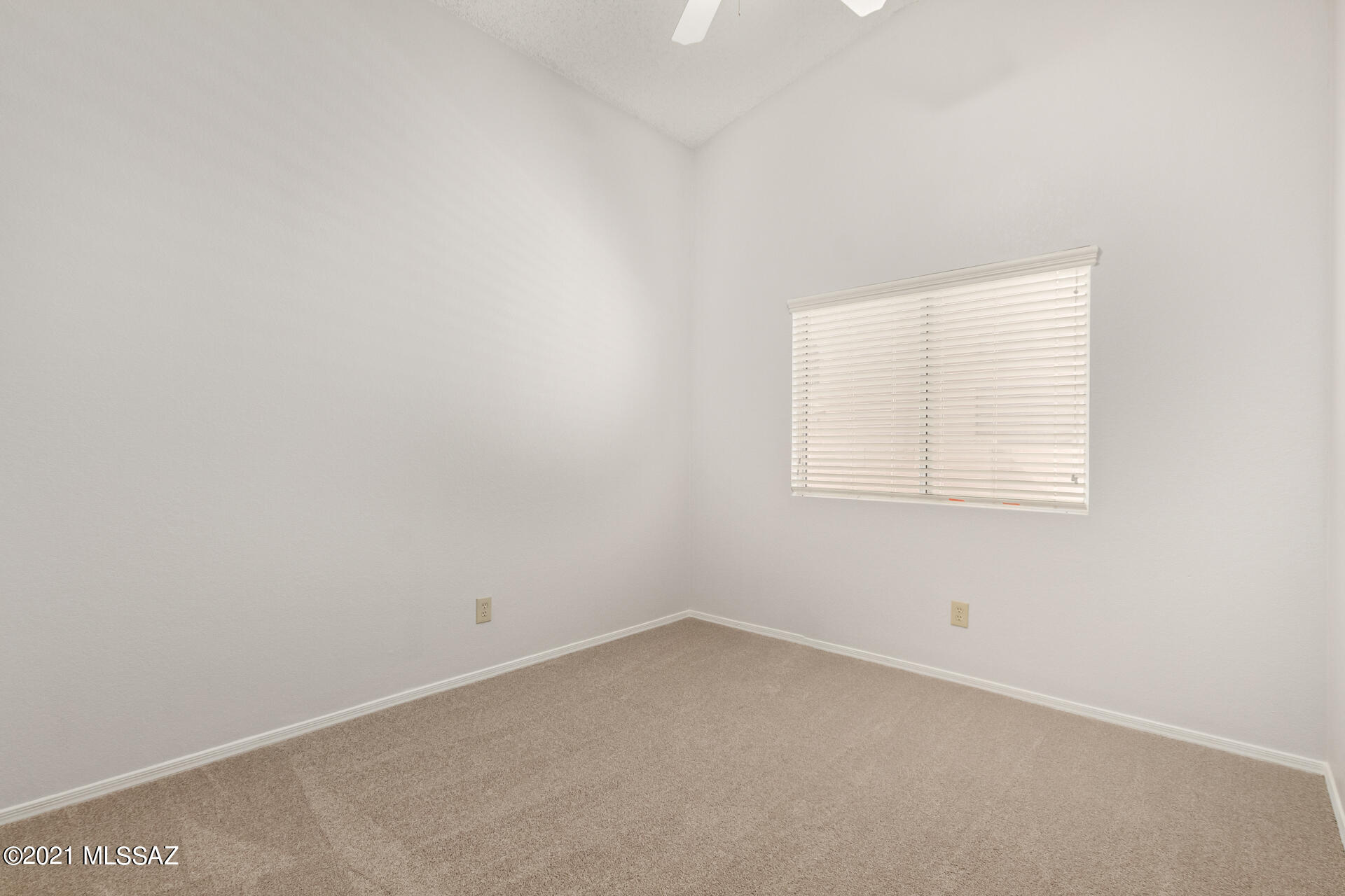 3034 West Sky Ranch Trail Tucson, AZ 85742 - Photo 19 of 27 an empty room with a window