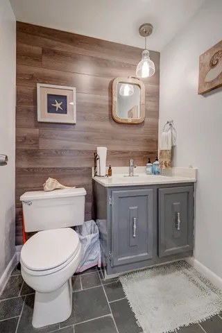 a kitchen with appliances a sink and cabinets