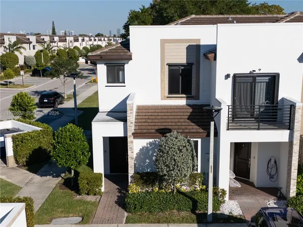 a view of a house with a street