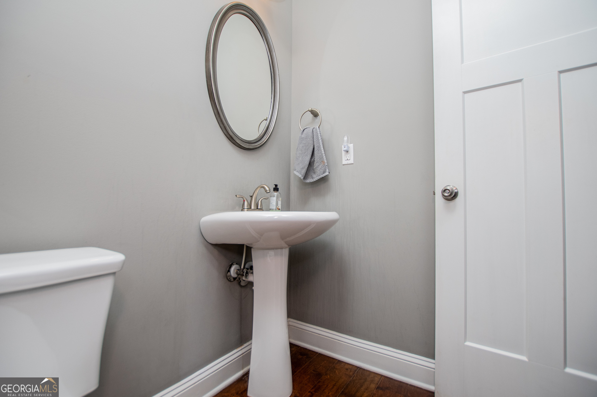 201 Overton Point Carrollton, GA 30116 - Photo 33 of 87 a bathroom with a sink toilet and a mirror