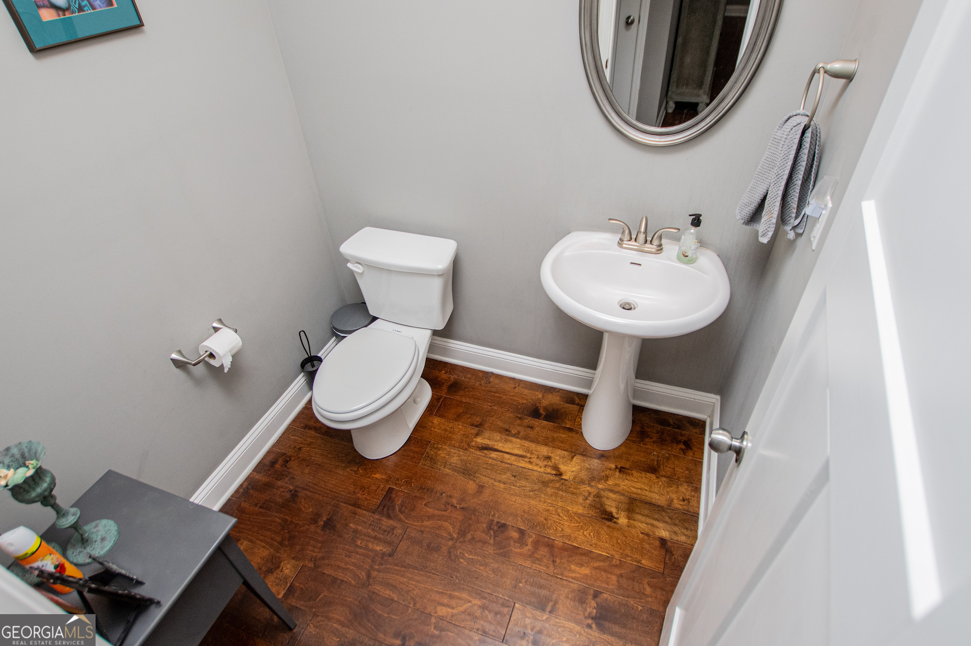 201 Overton Point Carrollton, GA 30116 - Photo 34 of 87 a bathroom with a toilet sink and mirror