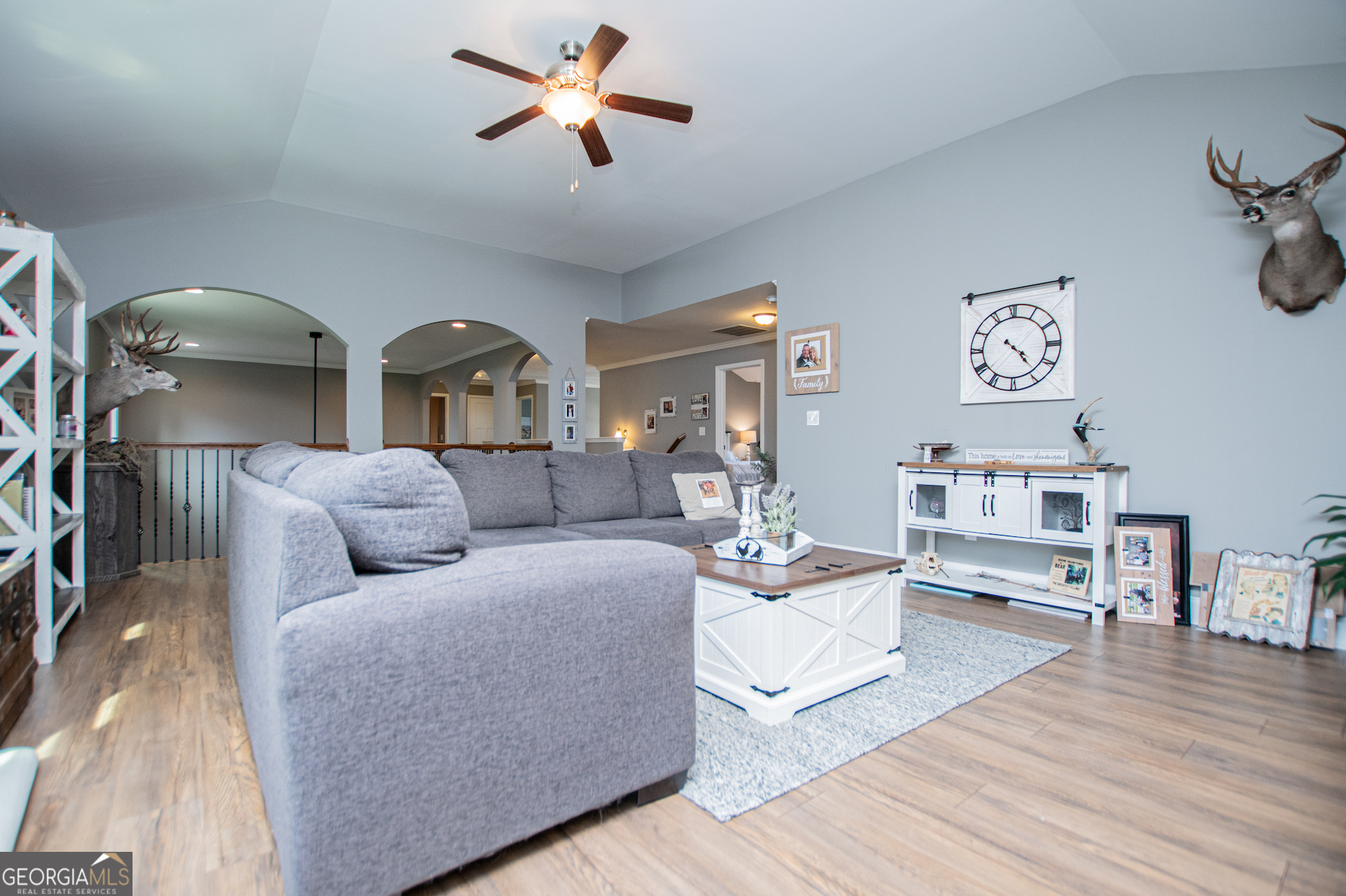 201 Overton Point Carrollton, GA 30116 - Photo 43 of 87 a living room with furniture and a wooden floor