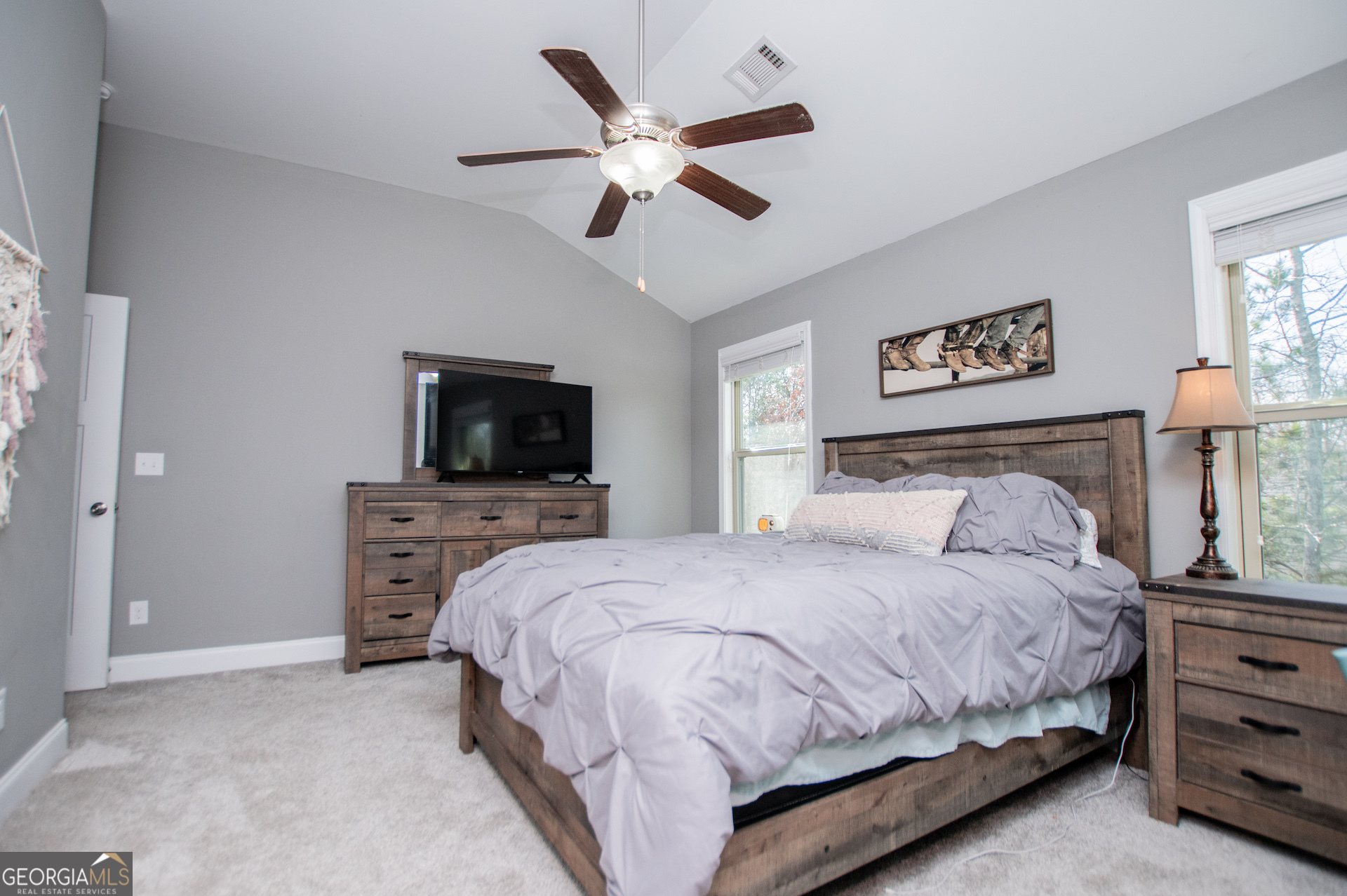 201 Overton Point Carrollton, GA 30116 - Photo 67 of 87 a bedroom with a bed and a television