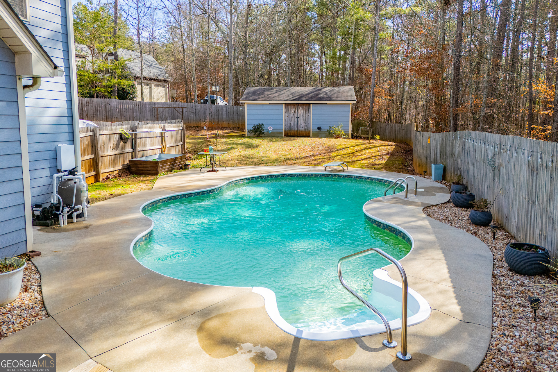 201 Overton Point Carrollton, GA 30116 - Photo 8 of 87 a view of a swimming pool with a sitting space