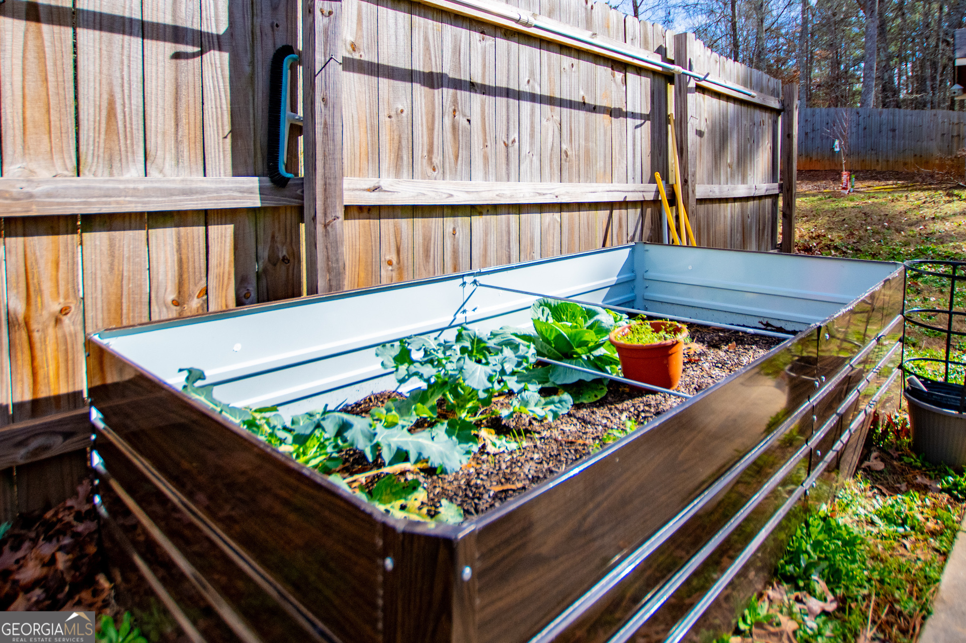 201 Overton Point Carrollton, GA 30116 - Photo 86 of 87 a wooden bench sitting in front of a building