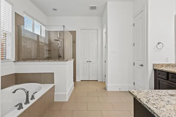 a view of living room with granite countertop furniture and fireplace
