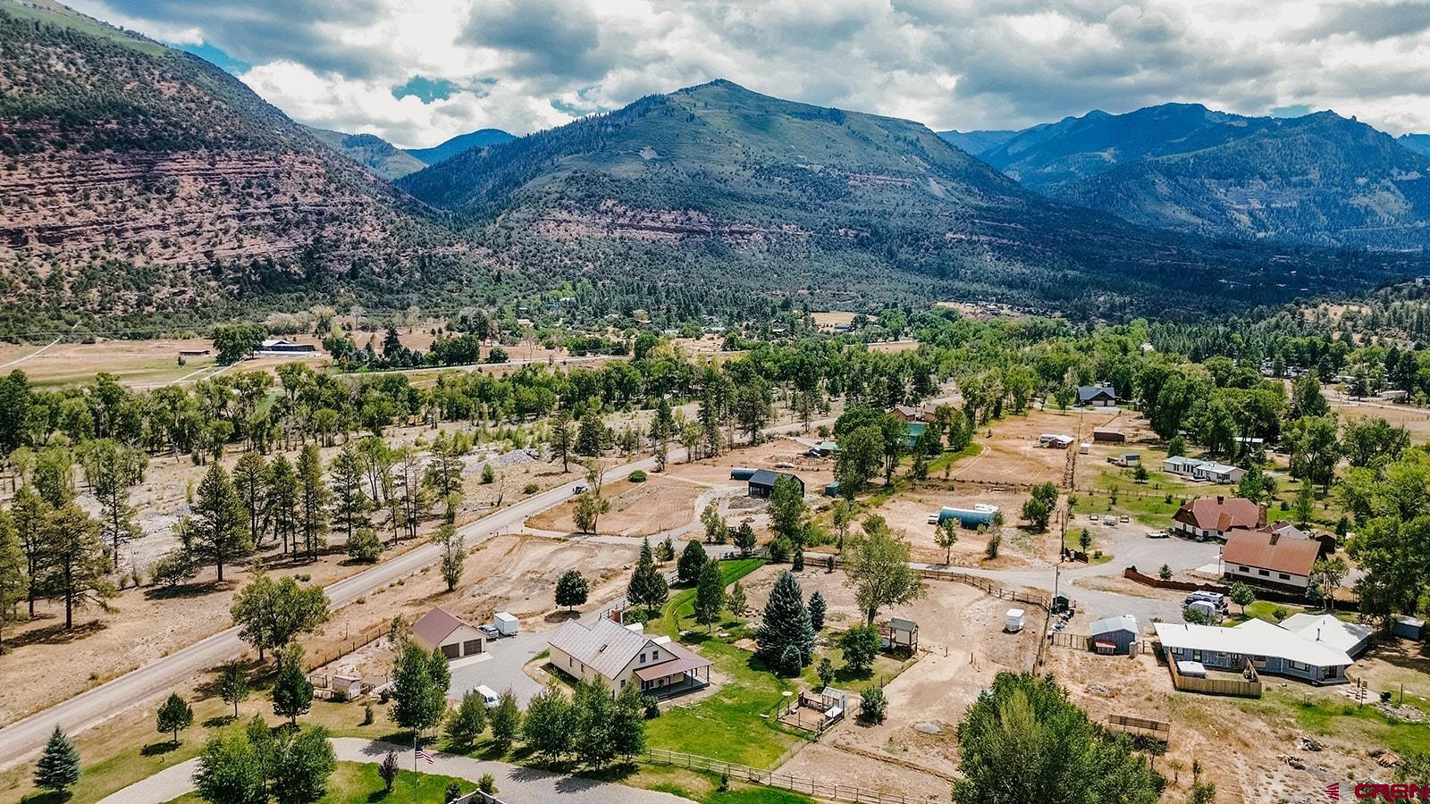 a view of a lot of trees and houses