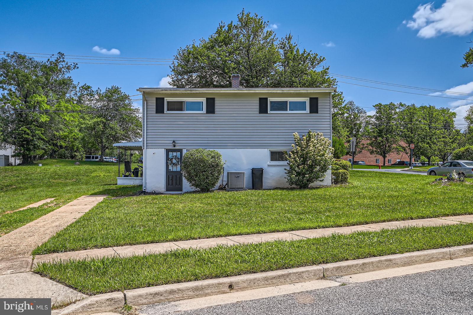 1201 Cobb Road Baltimore, MD 21208 - Photo 26 of 28 a view of a house with a yard