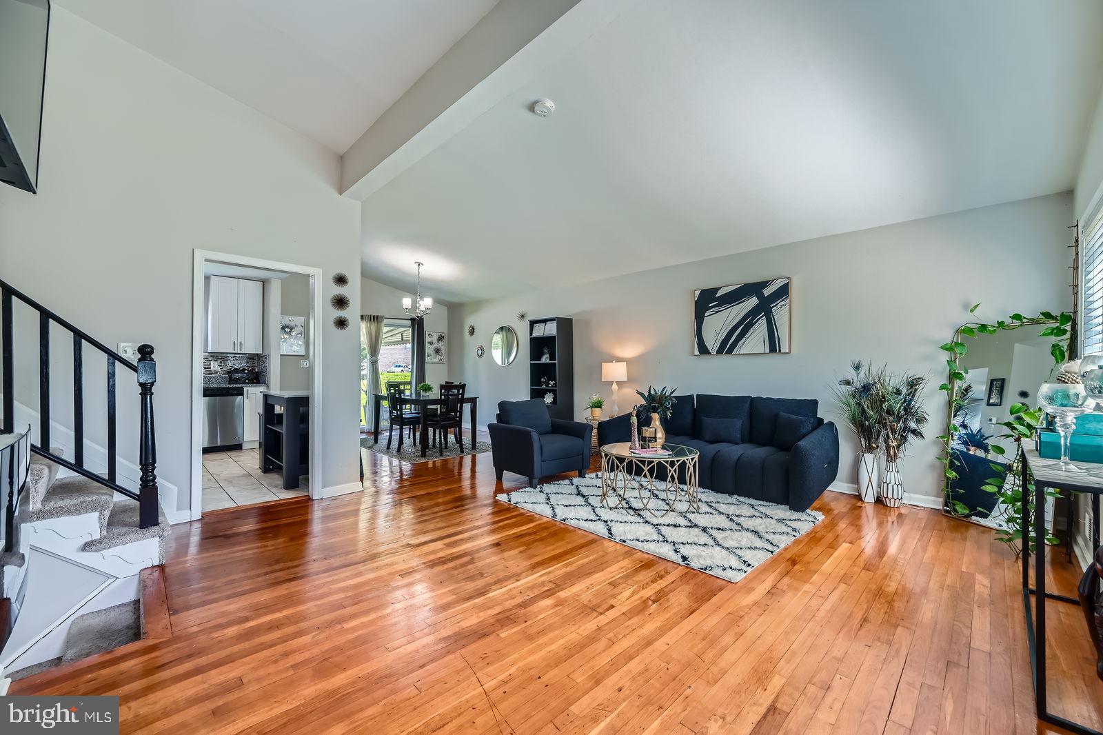 1201 Cobb Road Baltimore, MD 21208 - Photo 6 of 28 a living room with furniture and wooden floor