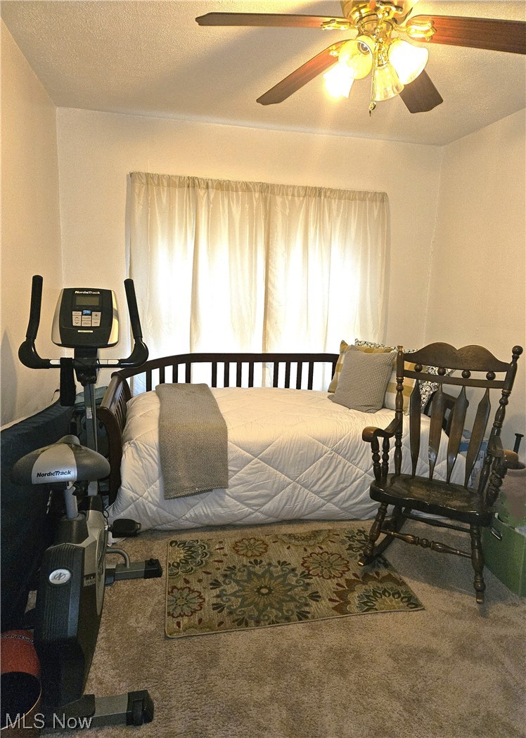 3364 Altamont Road Cleveland, OH 44118 - Photo 14 of 20 Carpeted bedroom with ceiling fan and a textured ceiling