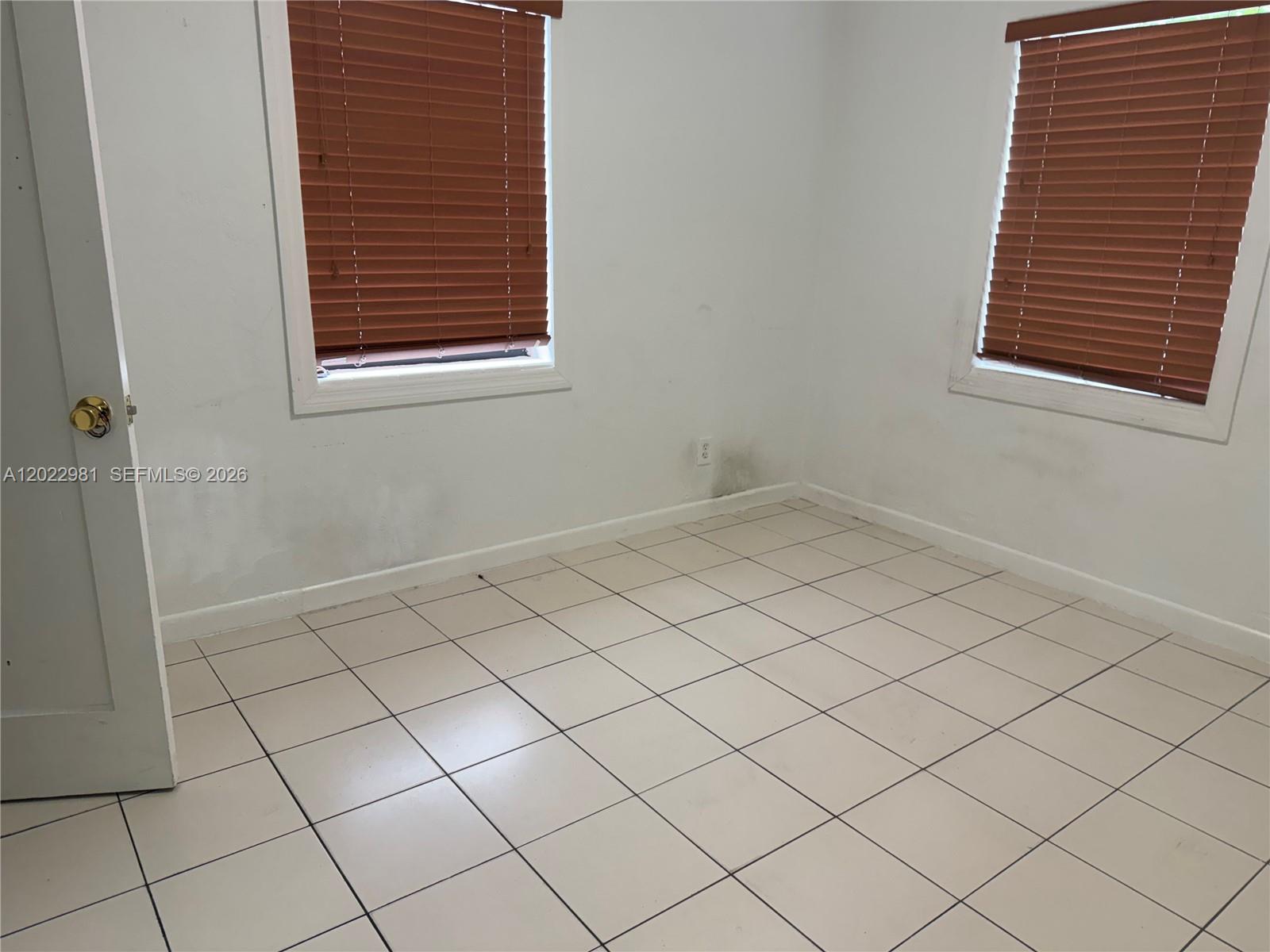 5940 Southwest 2nd Street Miami, FL 33144 - Photo 19 of 22 a view of a room and window