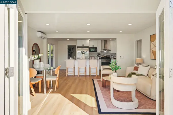 a living room with furniture and a table