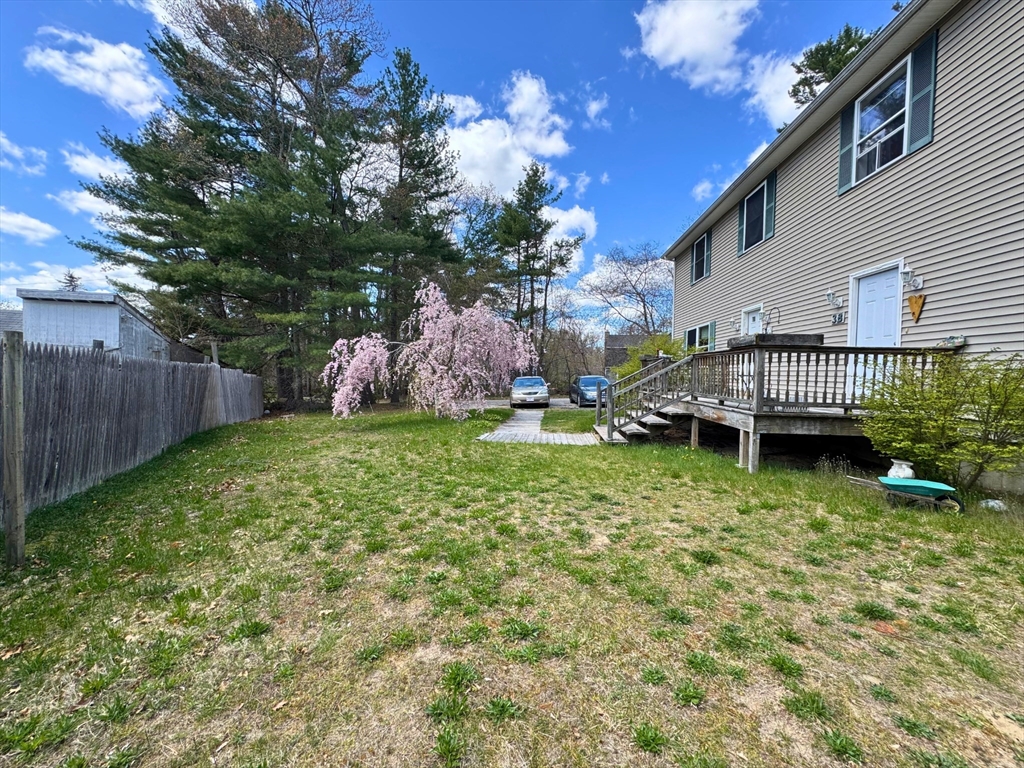 3 Davids Way, Unit A Wareham, MA 02576 - Photo 3 of 18 a front view of a house with garden