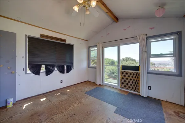 a view of a livingroom with a staircase