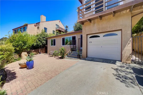 a view of a house with a patio