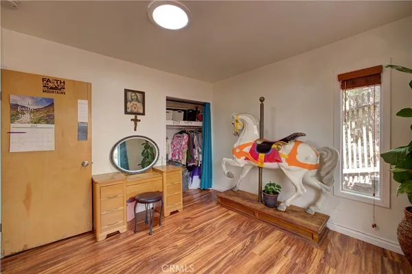 a view of livingroom with washer and dryer