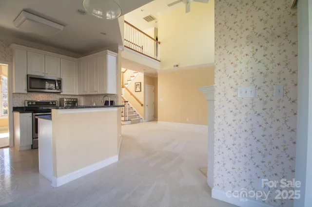 a spacious bathroom with a shower and a sink
