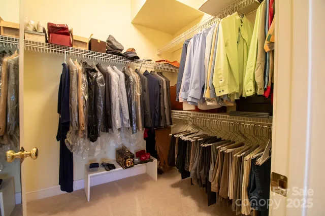 a bathroom with a toilet a sink and a mirror