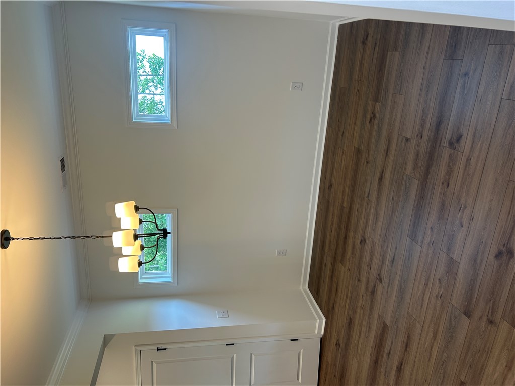 202 Bellflower Lane Pendleton, SC 29670 - Photo 6 of 27 Natural illumination highlights wood flooring and clean lines in this welcoming interior space.