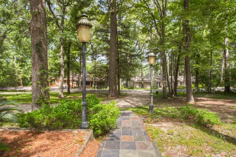 an aerial view of a house with yard