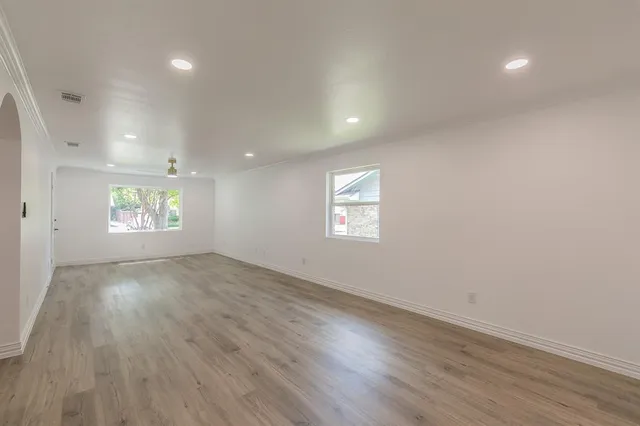 an empty room with windows