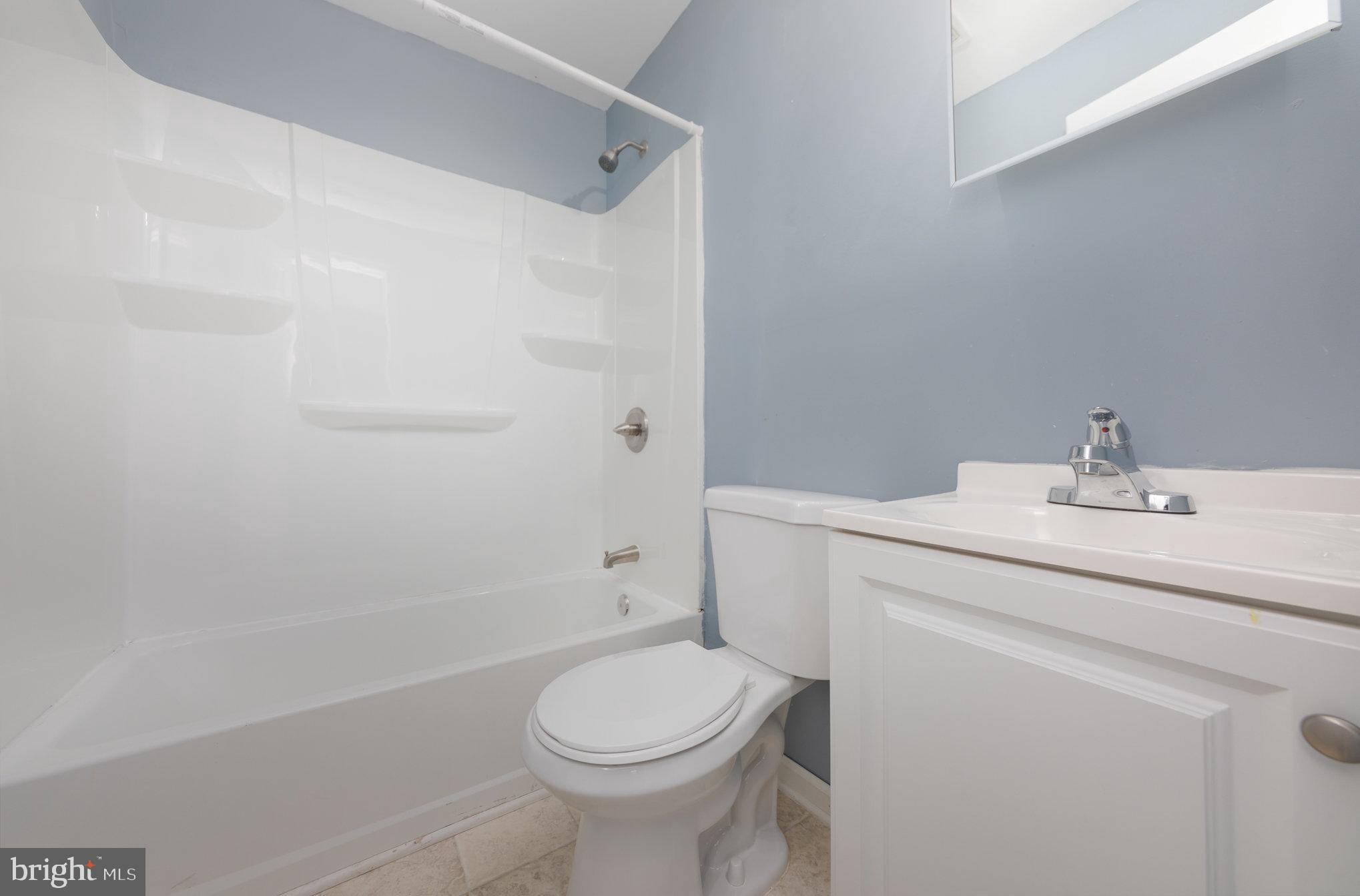 9003 Smiths Bend Road Fredericksburg, VA 22407 - Photo 13 of 22 a bathroom with a sink toilet and shower