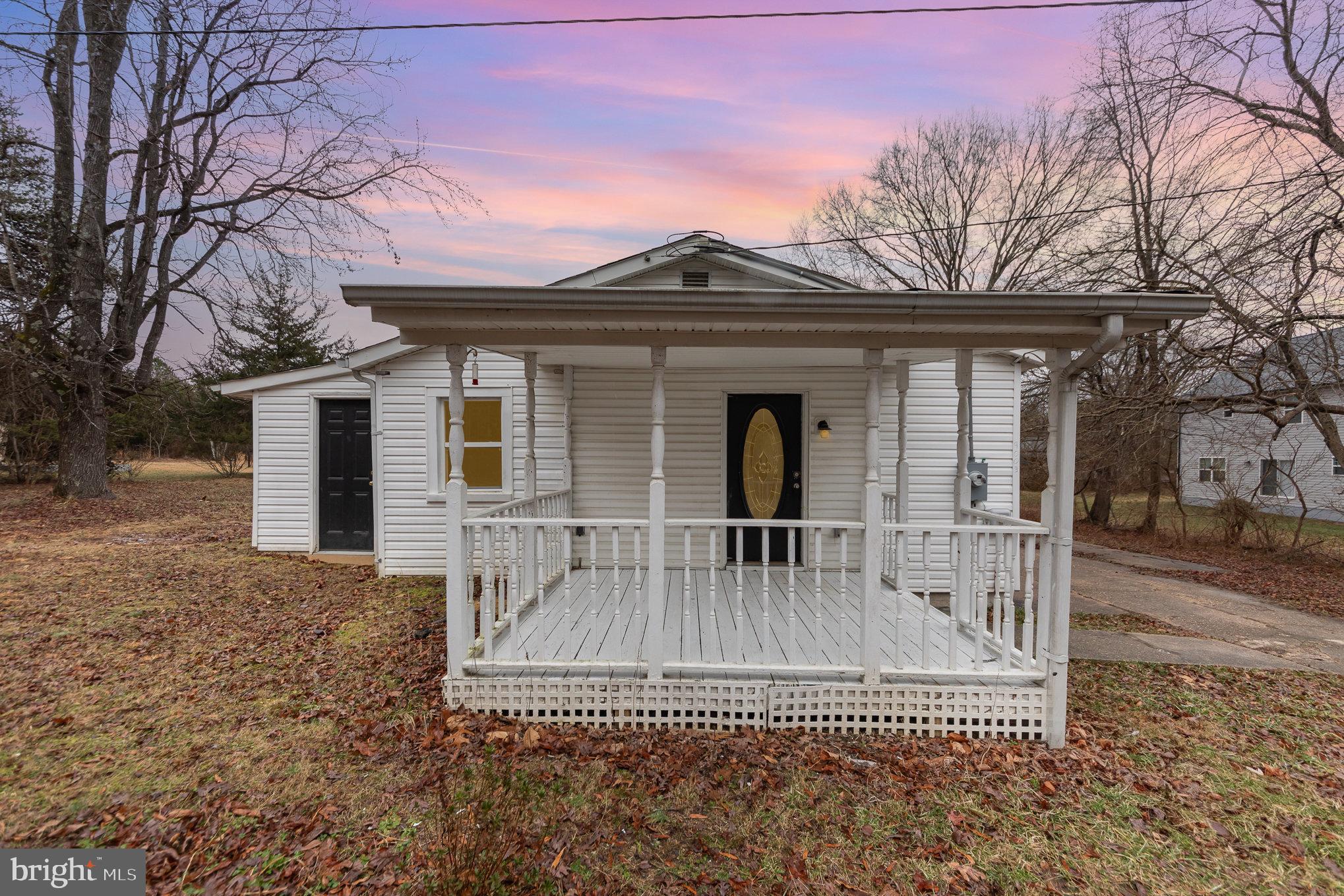 9003 Smiths Bend Road Fredericksburg, VA 22407 - Photo 2 of 22 a view of a house with a yard