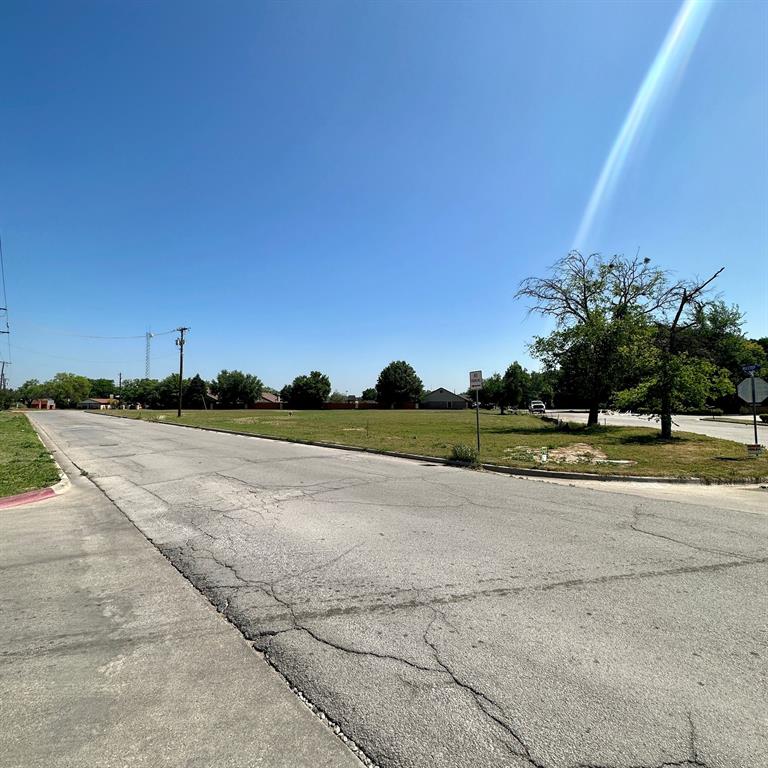 Tbd Hilltop Drive Springtown, TX 76082 - Photo 12 of 13 a view of street with houses in background