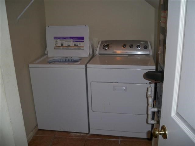 2529 Rio Grande Street, Unit 13 Austin, TX 78705 - Photo 4 of 10 a utility room with dryer and washer