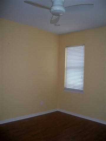 2529 Rio Grande Street, Unit 13 Austin, TX 78705 - Photo 5 of 10 an empty room with a window