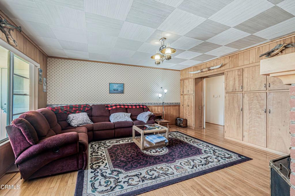 336 Doris Avenue Oxnard, CA 93030 - Photo 11 of 44 a living room with furniture and a rug