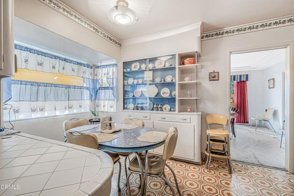 336 Doris Avenue Oxnard, CA 93030 - Photo 18 of 44 a kitchen with a table and chairs in it