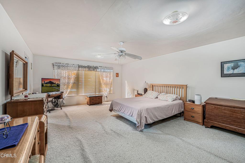 336 Doris Avenue Oxnard, CA 93030 - Photo 23 of 44 a spacious bedroom with a bed and a couch