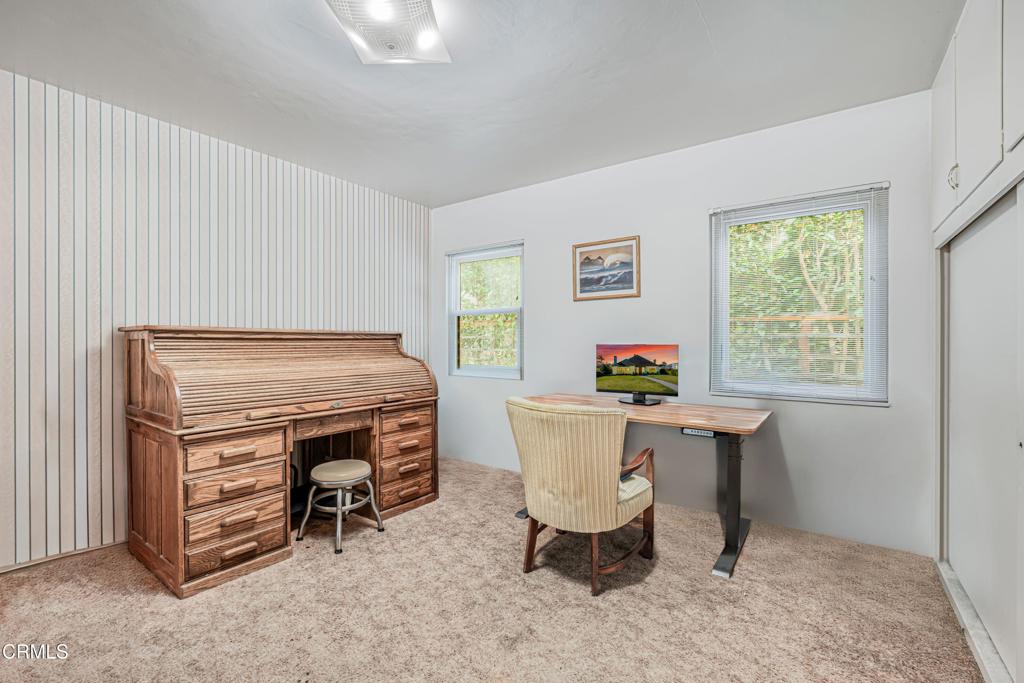 336 Doris Avenue Oxnard, CA 93030 - Photo 29 of 44 a living room with a table chairs and a window