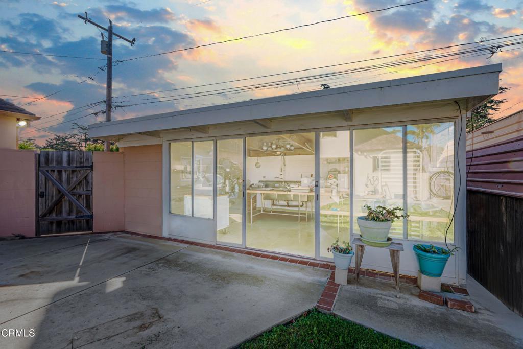 336 Doris Avenue Oxnard, CA 93030 - Photo 31 of 44 a living room with hardwood floor and a ceiling fan