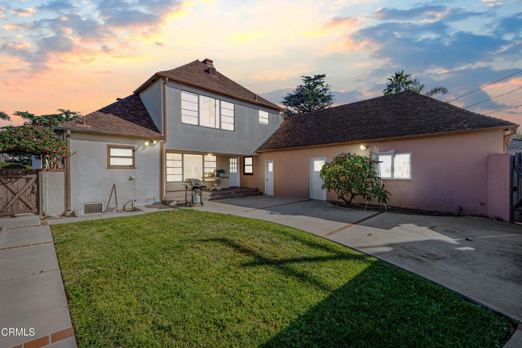 336 Doris Avenue Oxnard, CA 93030 - Photo 40 of 44 a front view of a house with a garden