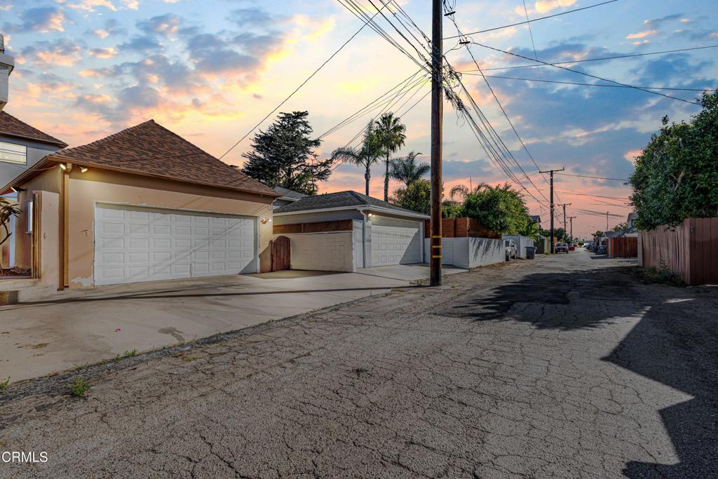 336 Doris Avenue Oxnard, CA 93030 - Photo 42 of 44 a view of a house with a yard and garage