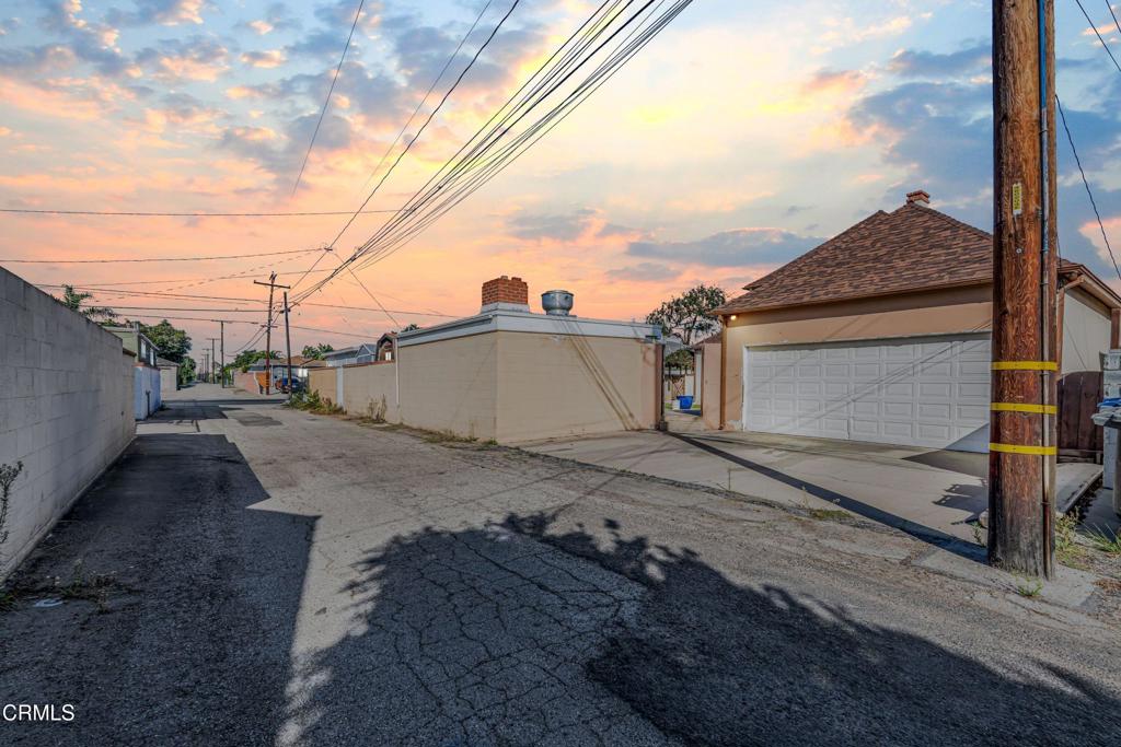 336 Doris Avenue Oxnard, CA 93030 - Photo 43 of 44 a view of a street with a house