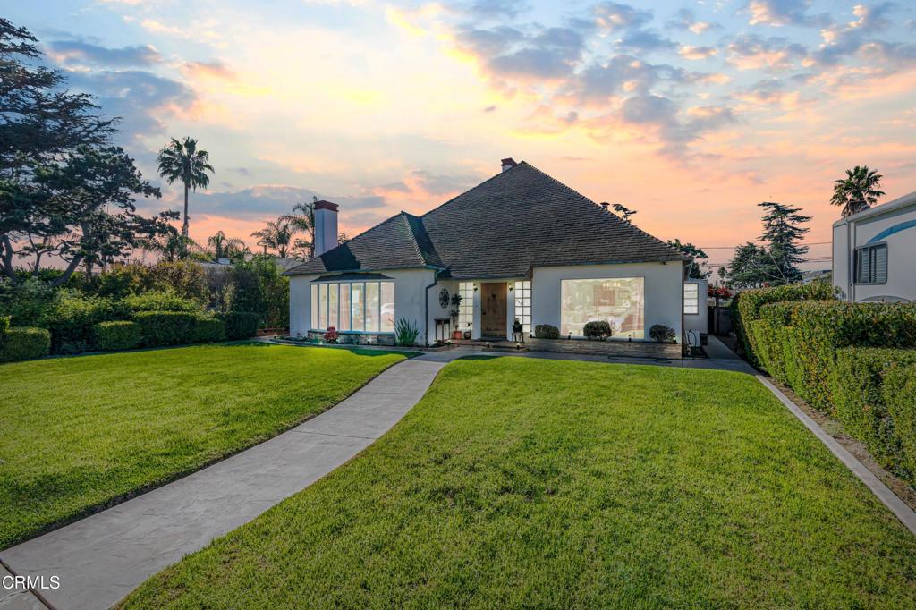336 Doris Avenue Oxnard, CA 93030 - Photo 44 of 44 a front view of a house with a yard