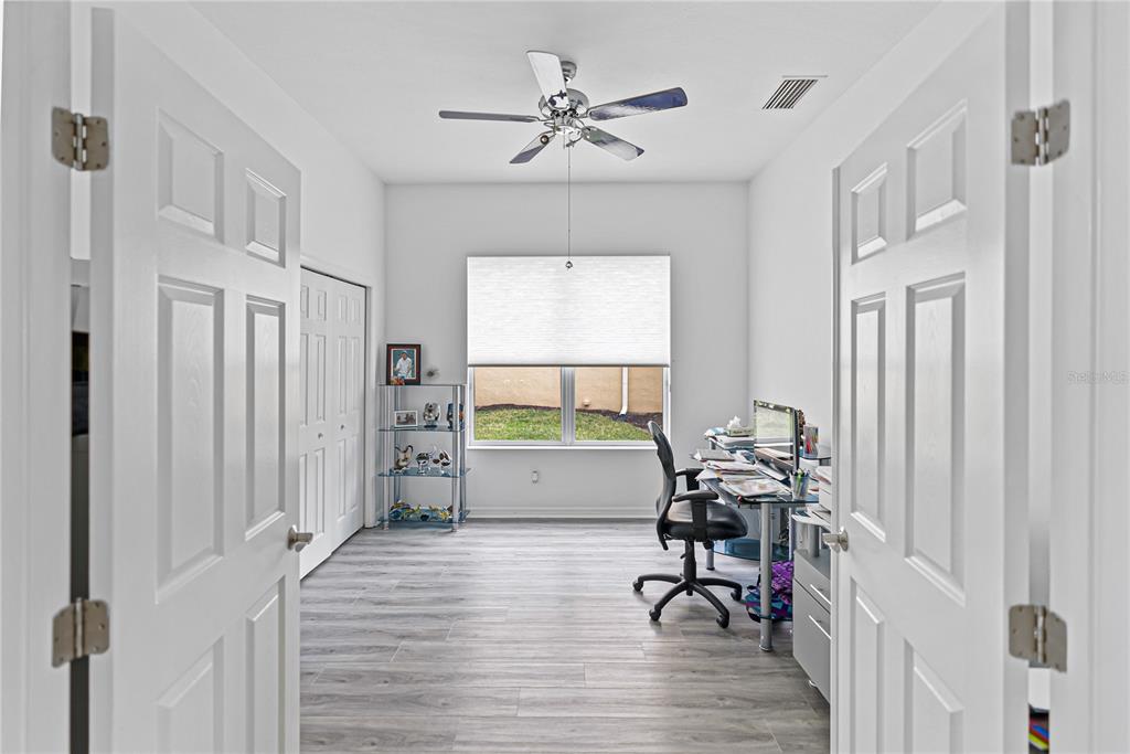 3671 Summerwind Circle Bradenton, FL 34209 - Photo 21 of 54 a view of a workspace with furniture and a window