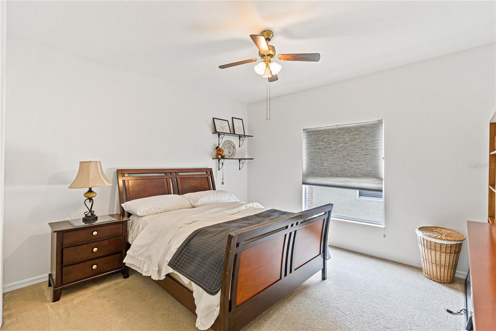 3671 Summerwind Circle Bradenton, FL 34209 - Photo 33 of 54 a bedroom with a bed and window