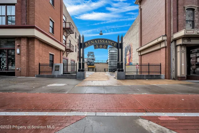 a view of a building with a street